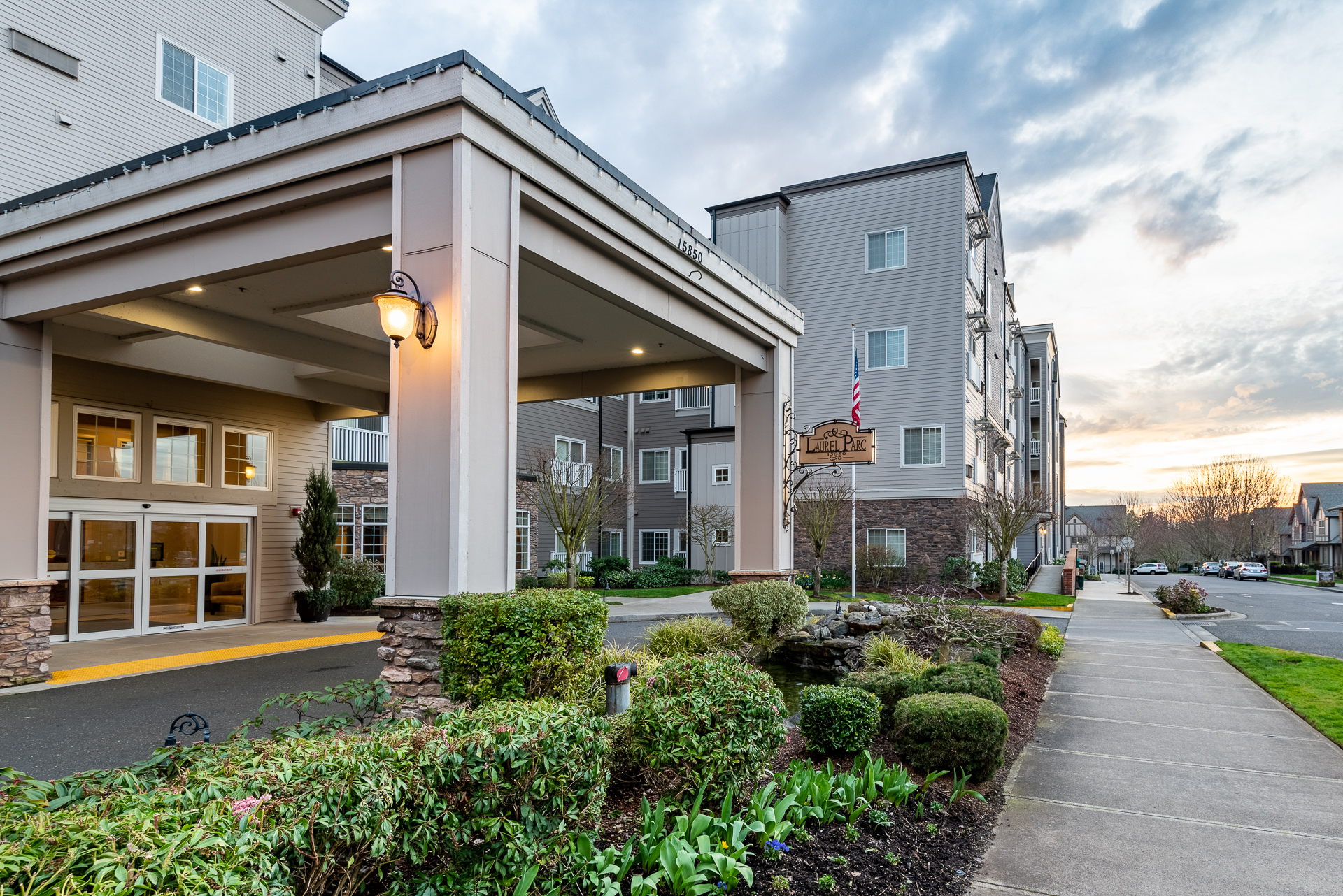 laurel parc retirement community front exterior at dusk